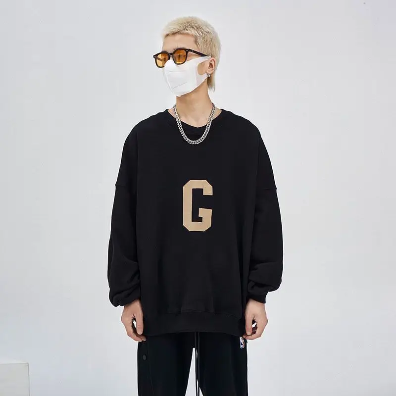 

2021 new winter print simple hedging men and women with the same style couple loose round neck sweater