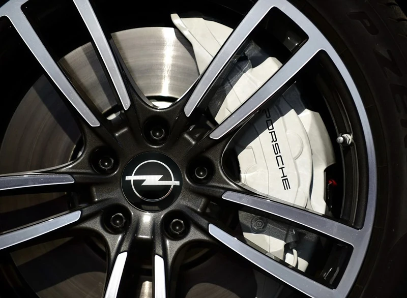 

4pcs 56/65mm Car Wheel Center Cover Stickers Emblem For Opel Astra H G J B K Insigina Corsa X D Vectra C Vivaro E Zafira B Mokk