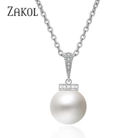 zakol fashion zirconia crystal pendant necklace for elegant women round simulated pearl wedding jewelry wholesale fsnp2058