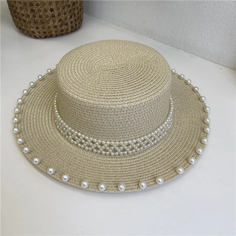 

Korean versatile casual sunshade hat small fresh French hat summer new Pearl flat top straw hat girl