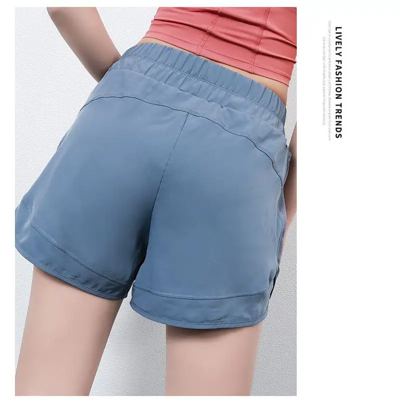 

2021 New Sports shorts women summer loose lined mesh stitching pockets running pants fitness hot pants yoga pants