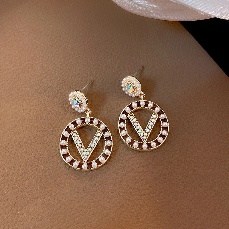 

100pcs/lot needle simple geometric round v-shaped earrings Korea temperament pearl earrings new earrings women