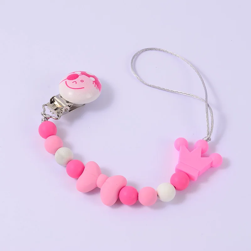 

BPA Free Safty Silicone Crown Bow Beads Baby Teether Pacifier Chain Wooden Clip Nipple Holder for Baby Gifts Personalised Name