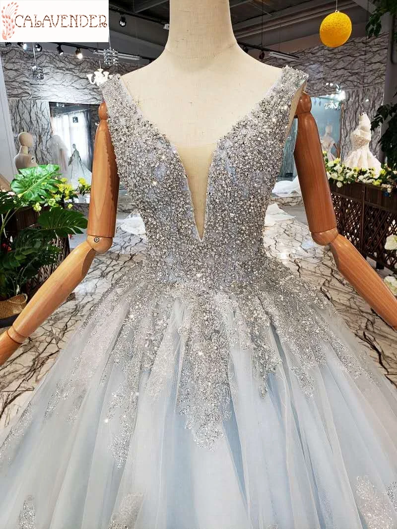 

Illusion Deep V-Neck Ball Gown Wedding Dresses Major Beaded Ivory Wedding Dress Lace Appliques Vestido De Novia