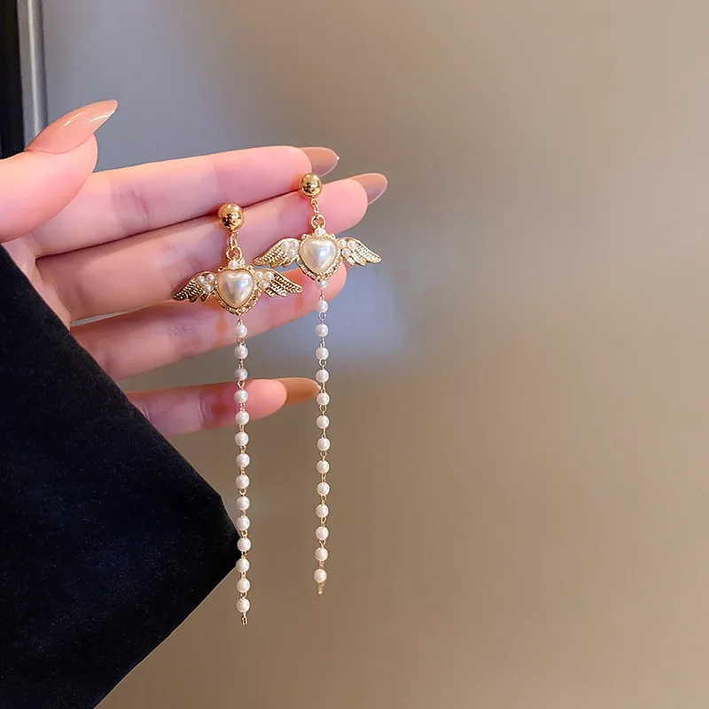 

LOVOACC Trendy Gold Color Metal Love Heart Wings Dangle Earring for Women Long Tassel Metal Simulated Pearl Beach Earring Gifts