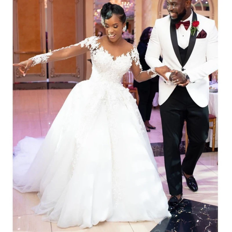 

White Lace Beaded Bridal Dresses Long Sleeve African Wedding Dresses 2021 Sheer Illusion Appliques Tulle Wedding Gowns Mariage