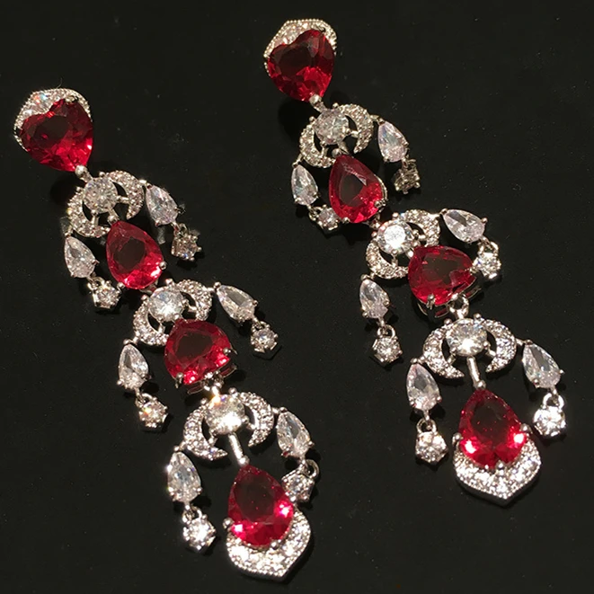 Массивные серьги с красными кристаллами висячие кисточками хорошее ювелирное