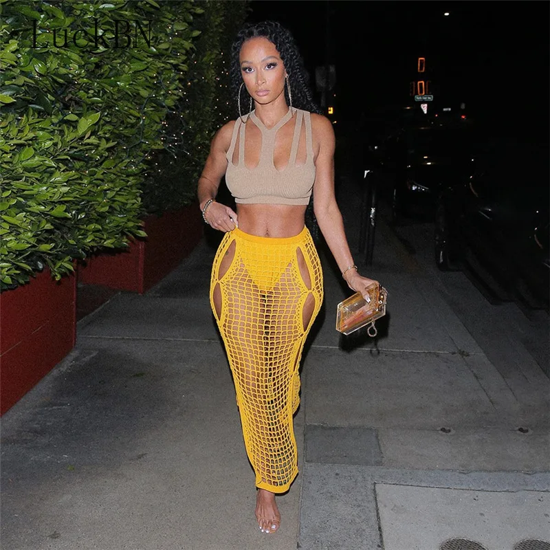 

Summer Knitting Sexy Maxi Skirt Women Elastic See-Through Hollow Grid Party Streetwear Bottom Solid Color Sukienka Skirt 2021
