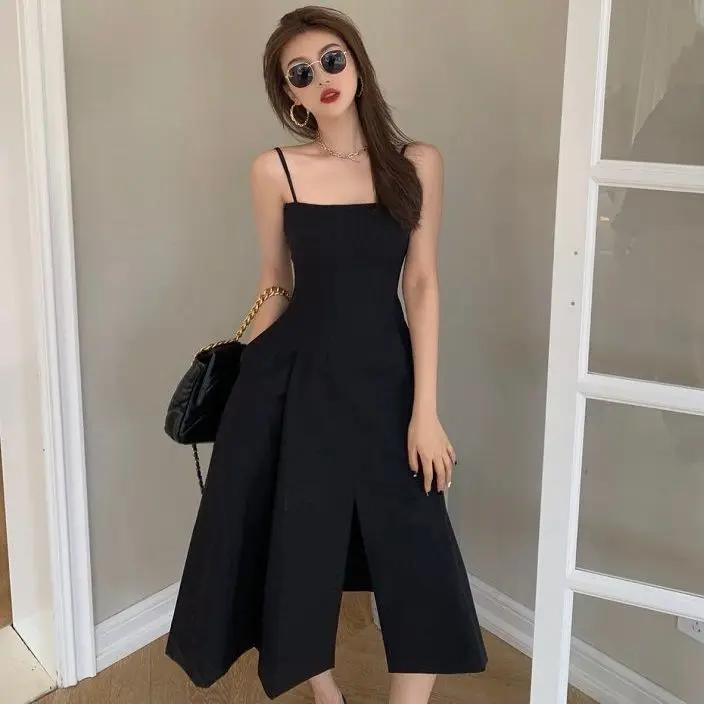 

The black sling dress featured a slim summer dress vestidos de mujer Beach Style COTTON Hollow Out Spaghetti Strap