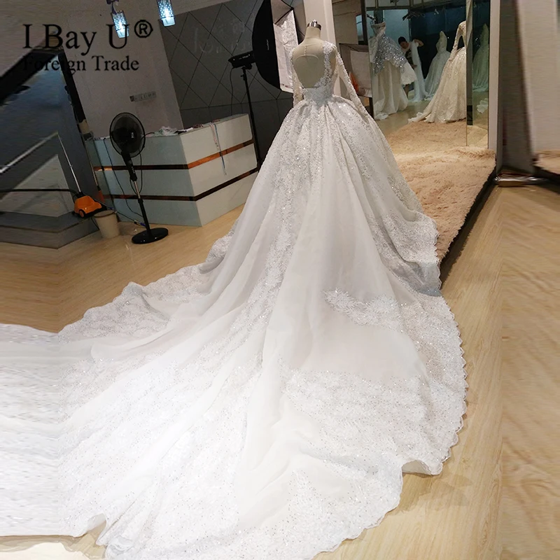 Роскошные свадебные платья с длинным рукавом украшенные камнями 2020