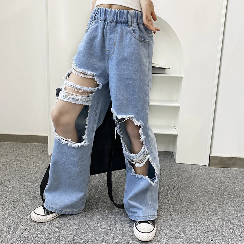 Рваные джинсы для девочек новинка весны 2021 стильные свободные подходящие ко