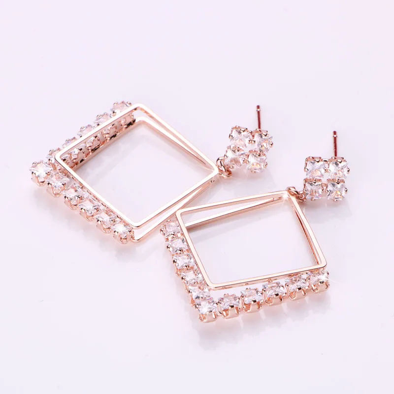 

Hgflyxu High Quality Square Crystal Zirconia Earrings for Women Rose Gold Color Fashion Jewelry New Design2021 Dangle Earrings