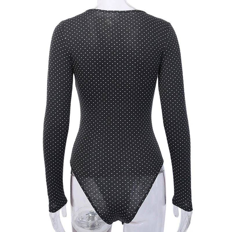 Комбинезон в горошек Облегающий комбинезон с запахом и V-образным вырезом