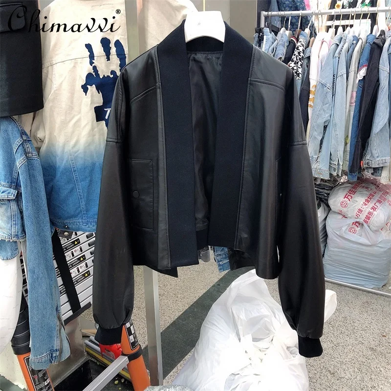 

2021 Autumn New Stand Collar Stitching Knitted Loose Cardigan Cool Fashion Long Sleeve Black Coat Top for Women