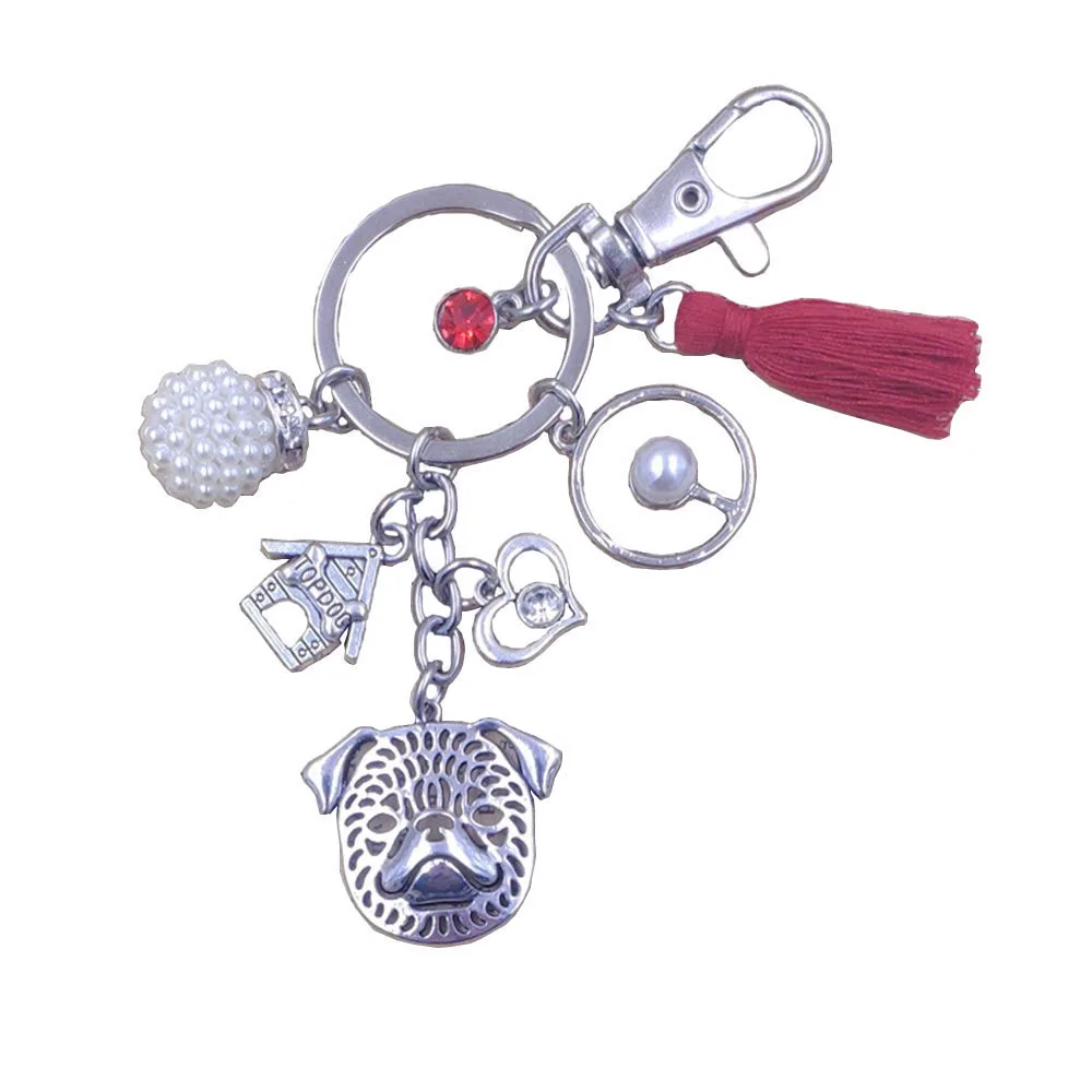 Брелок в виде собаки гриффона стиле милитари брелок ручной работы с кисточками