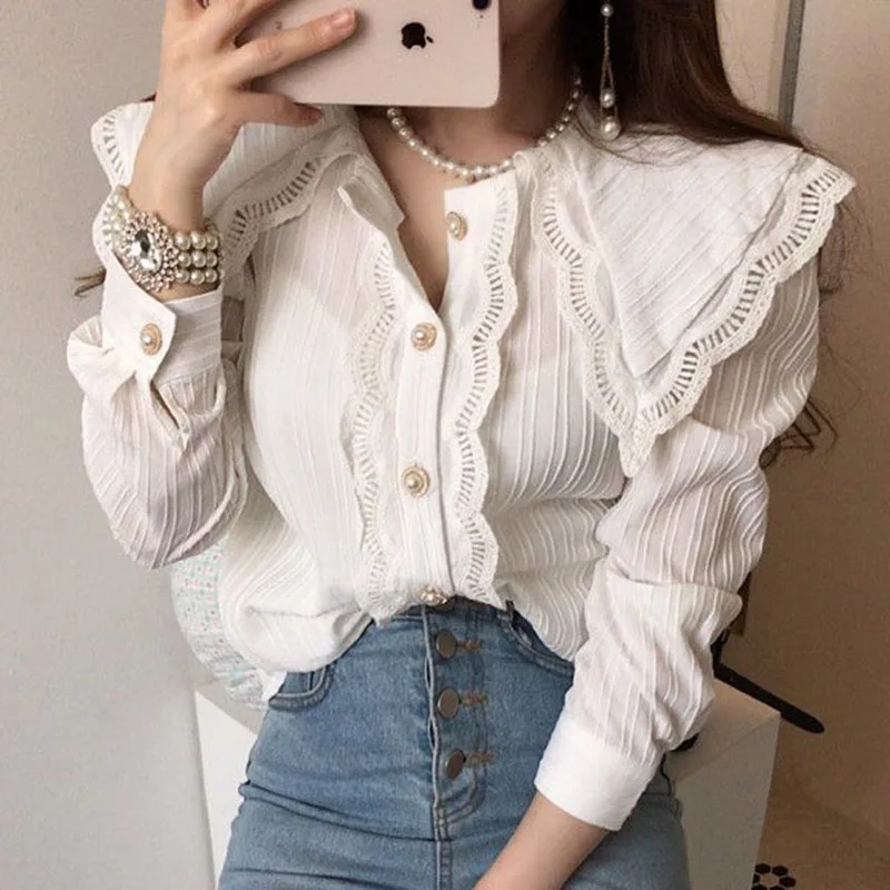 

COIGARSAM Shirt Womens Tops Puff Sleeve Turn-down Collar Pearl Women Shirts