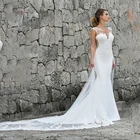 Модное свадебное платье с драгоценным вырезом без рукавов с кружевной аппликацией и шлейфом