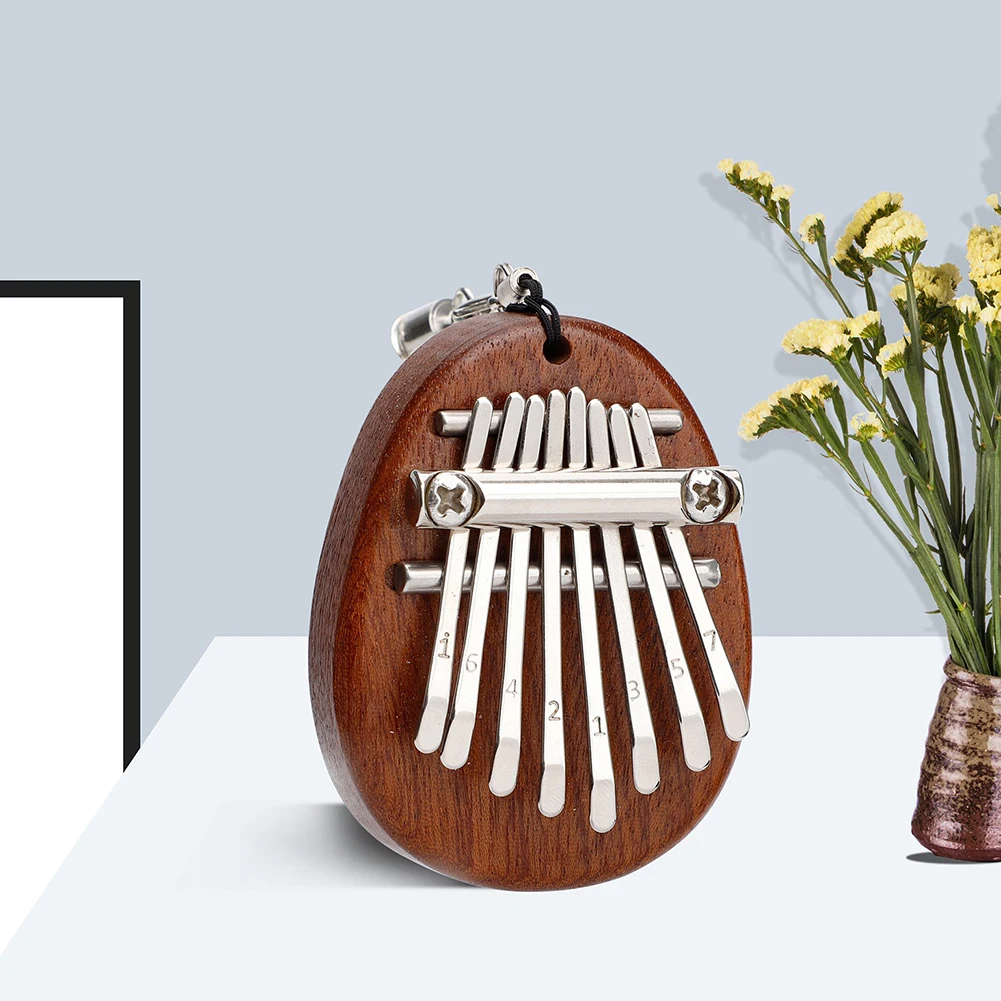 

8 Key Mini Kalimba Exquisite Finger Thumb Piano Marimba Musical Instrument Africa Finger Piano Good Accessory Pendant Gift