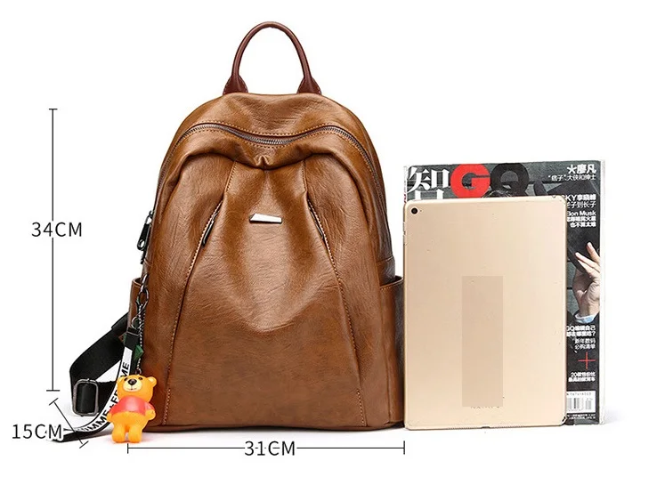 Винтажный женский кожаный рюкзак с заклепками защитой от кражи дорожный