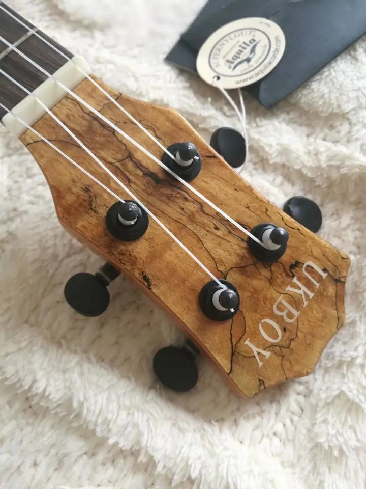 

23 Inch Ukulele Four String Spruce Rotten Wood Veneer