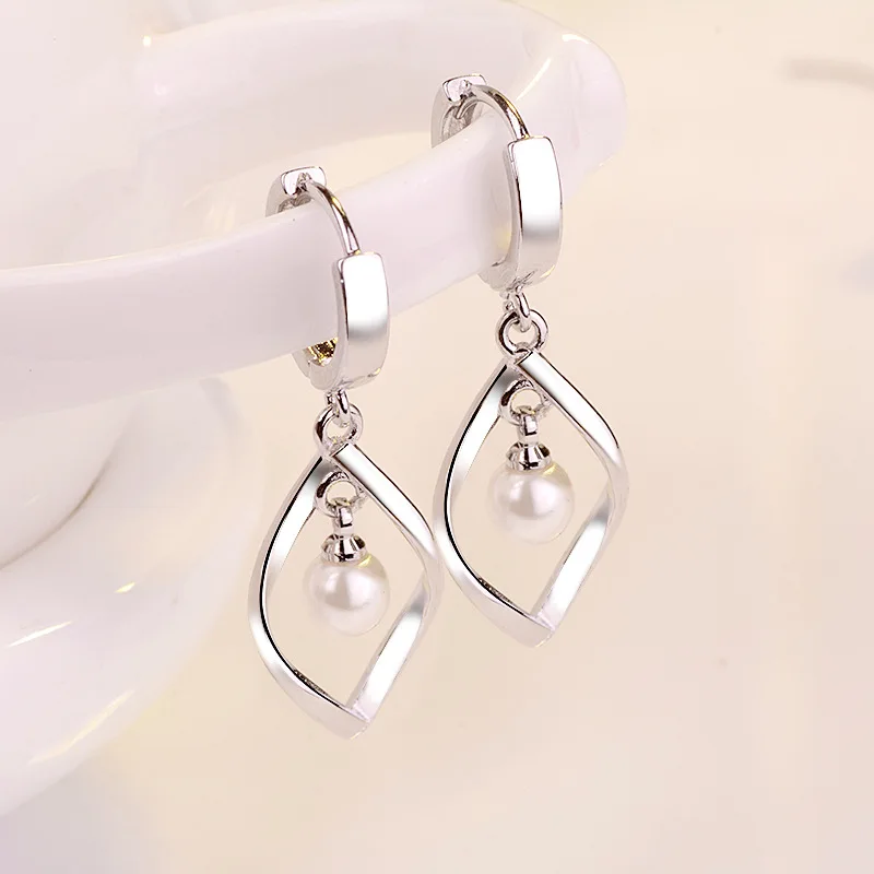 

Zhenrong Simple Copper Ornaments Earrings Women's Rotating Love Pearl Earrings Women's Mid-Length Earrings Reverse Fashion