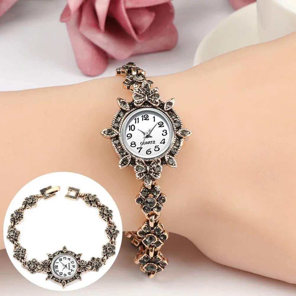 

Vintage Women Rhinestone Flower Charm Round Dial Analog Quartz Bracelet Watch