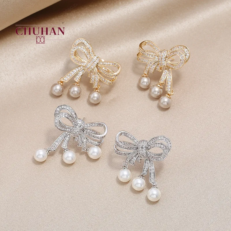 Женские серьги-гвоздики в виде банта золотого и серебряного цвета | Украшения