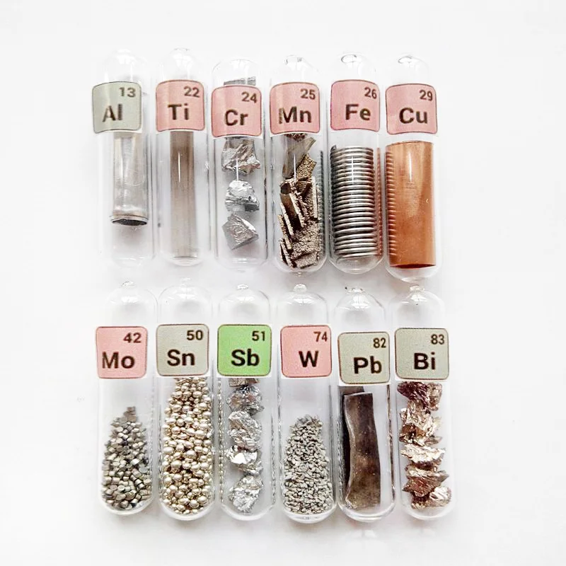 

A set of glass seals of 10 element samples Al Cr Mn Fe Cu Mo Sn Sb W Pb Bi Ti collected from the periodic table