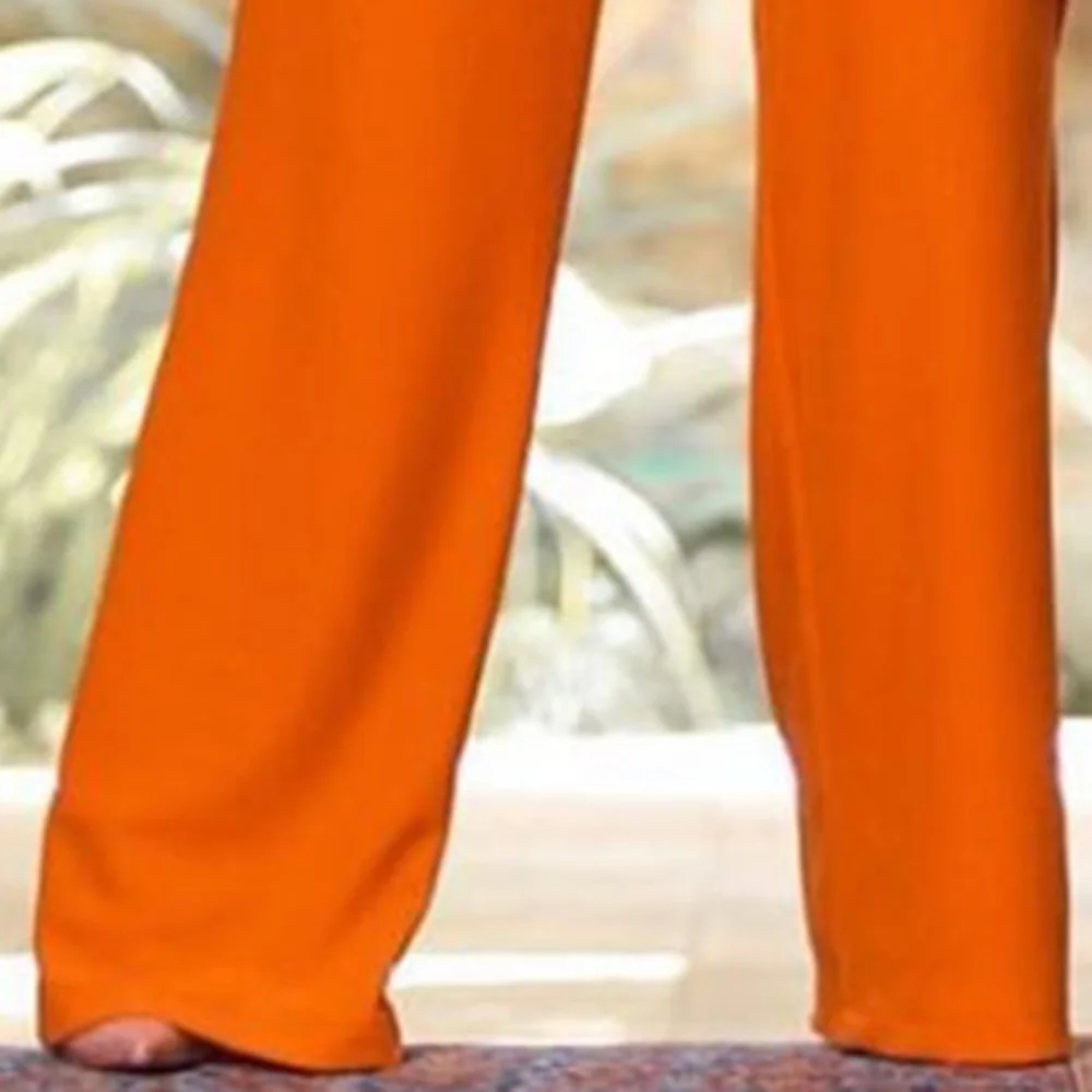 Комплект из двух предметов: Топ и штаны с высокой талией оранжевого цвета