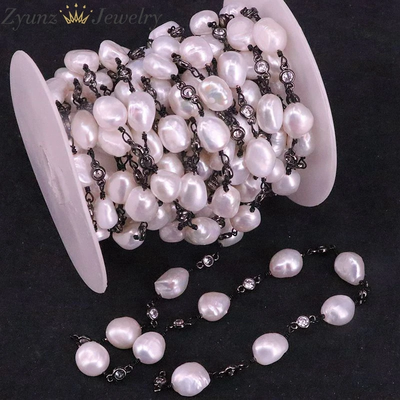 Цепочка с пресноводным жемчугом и белым цирконием разделенная бусинами из
