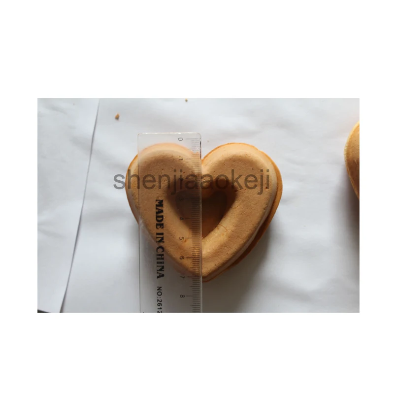 

Commercial electric baking doughnut machine crispy machine electric doughnut baking machine heart shaped doughnut