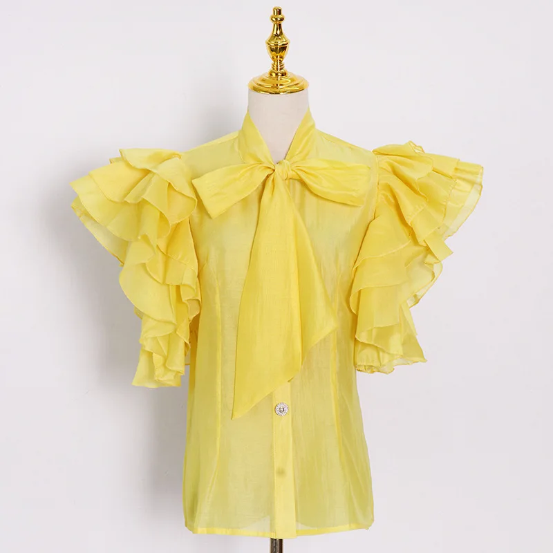 

Elegant Bow Tied Solid Stand Collar Shirt Women Ruffles Pleated Short Sleeve Button Up Blouse 2021 Summer Sexy See Through Tops