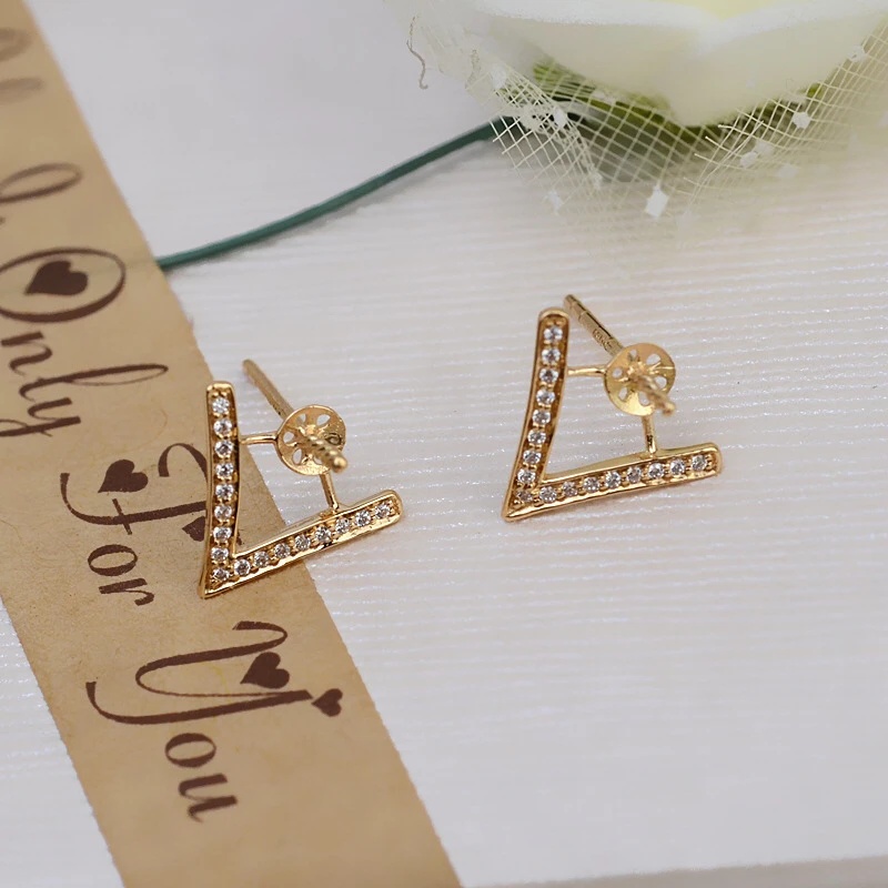 Рисунок 4 - Оригинальные золотые серьги в форме сердца AU 750 18K