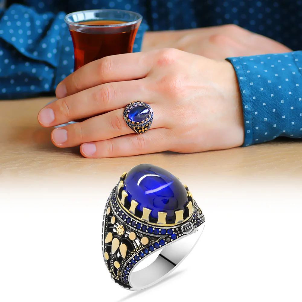 

Мужское кольцо из серебра с голубым Цирконом овальной формы