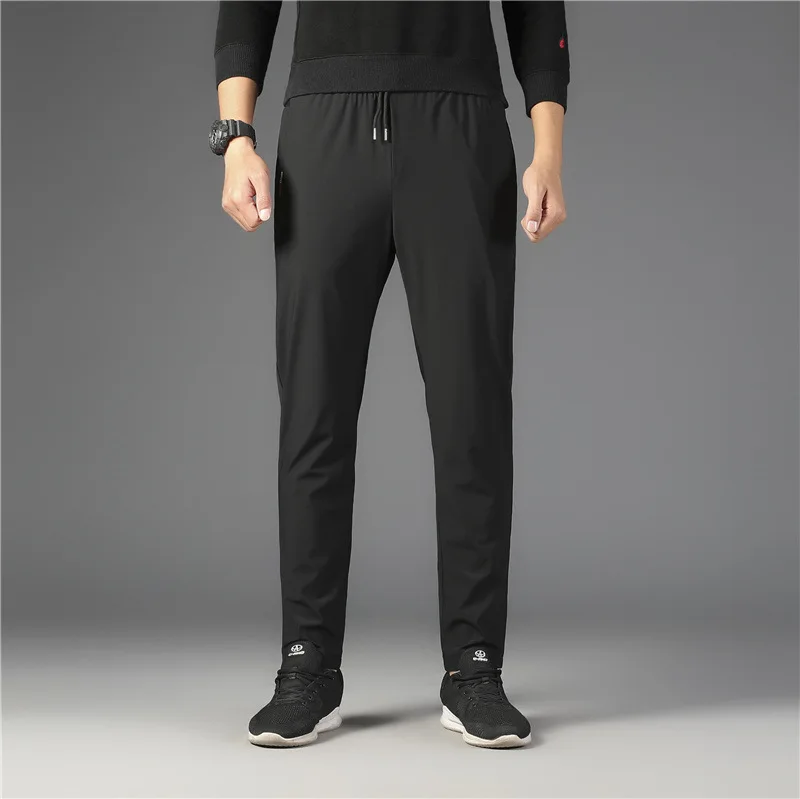

Ice fast drying sports casual pants 2021 new men's loose straight large pants men's pants thin summer