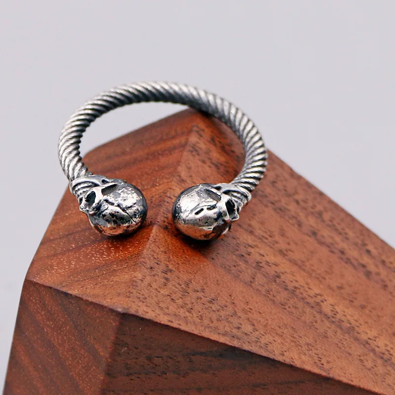 Мужское и женское кольцо с двойным черепом регулируемое черного цвета из 100%