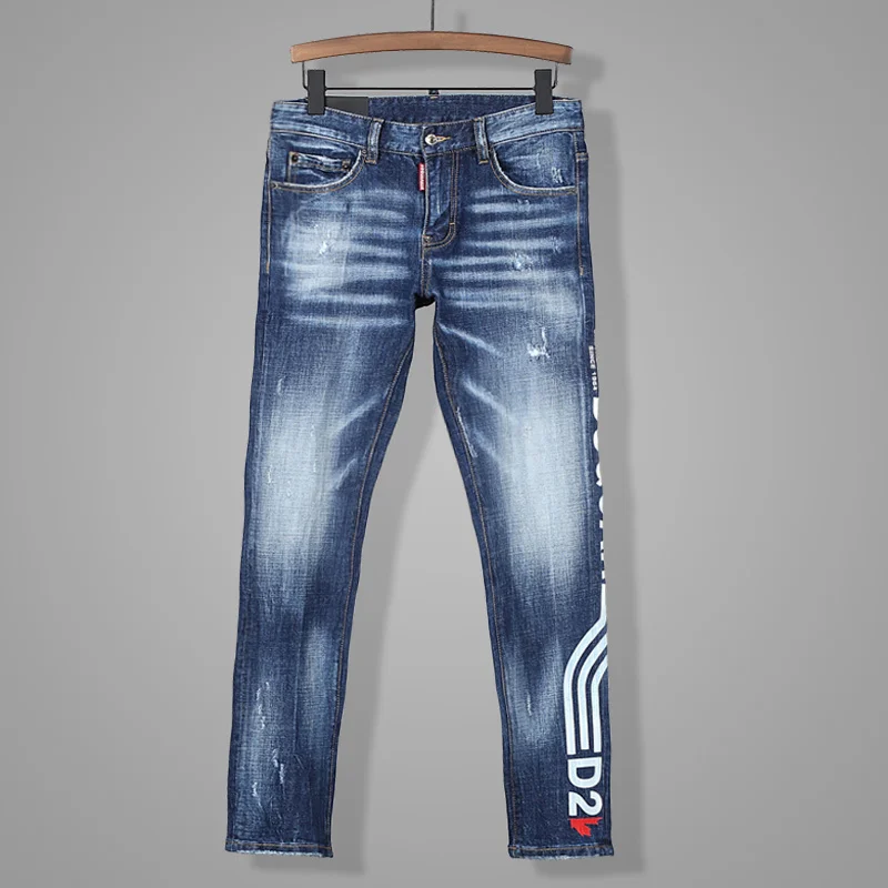 

Брендовые европейские мужские бриджи dsq, дизайнерские крутые джинсы, мужские облегающие джинсы, джинсовые брюки, синие брюки с отверстиями, ...