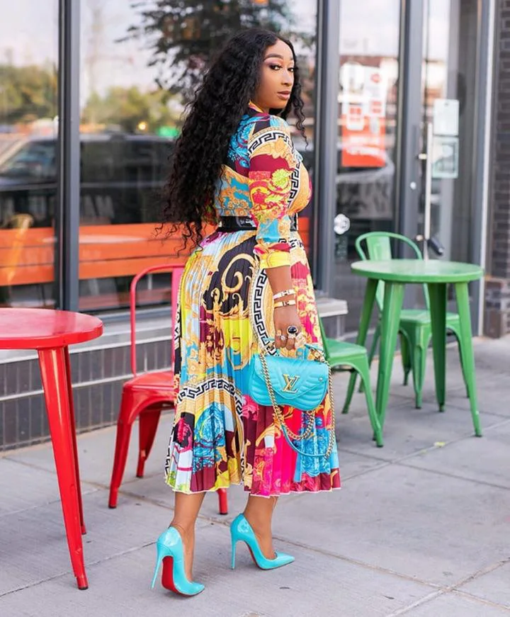 

Spring / summer 2021 new dress African print bow 7 / 4 sleeve medium length dress large women's dress