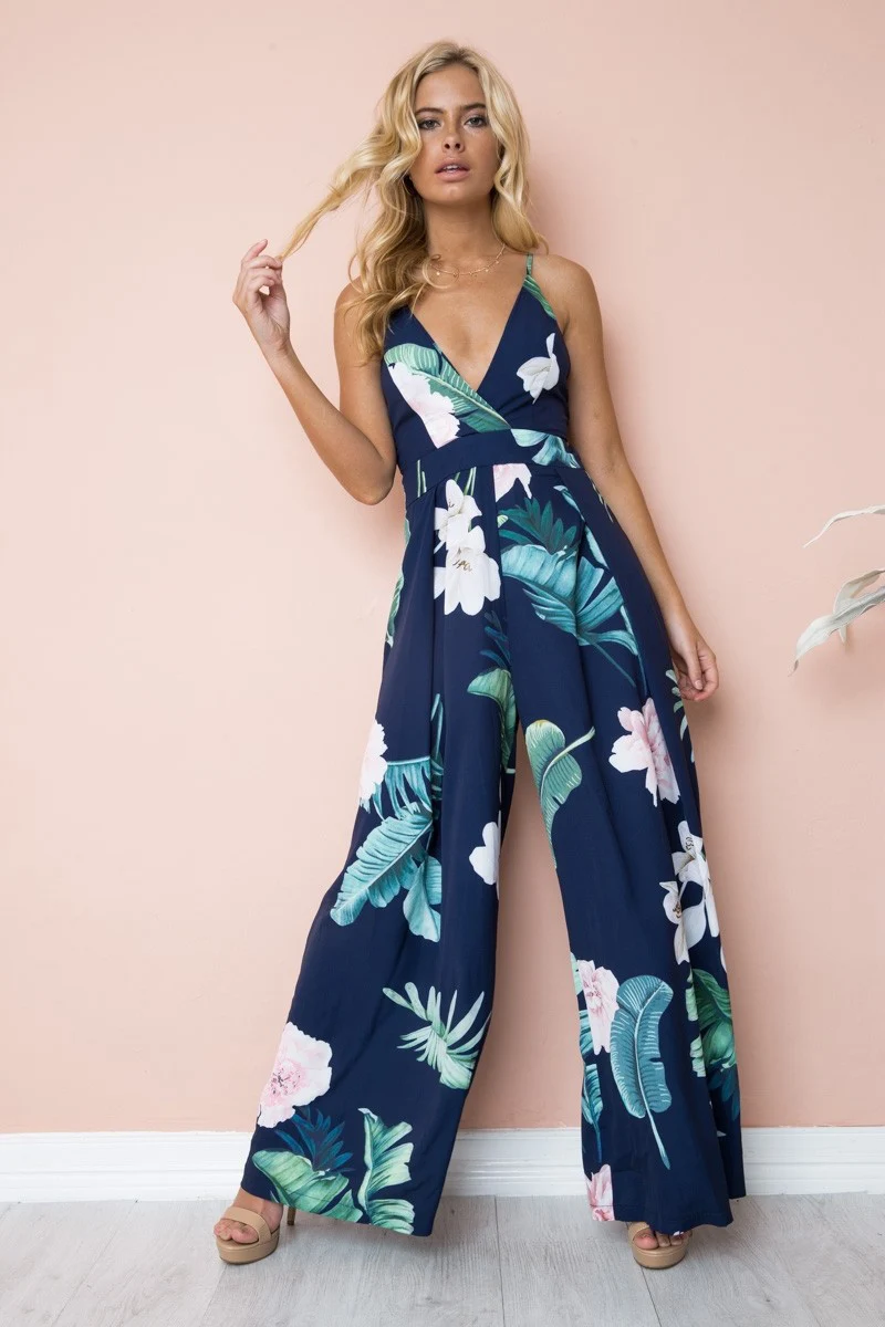 Nadafair Boho Цветочные Комбинезоны для женщин V образным вырезом спинки Лук ремень Летний Пляжный комбинезон длинные брюки
