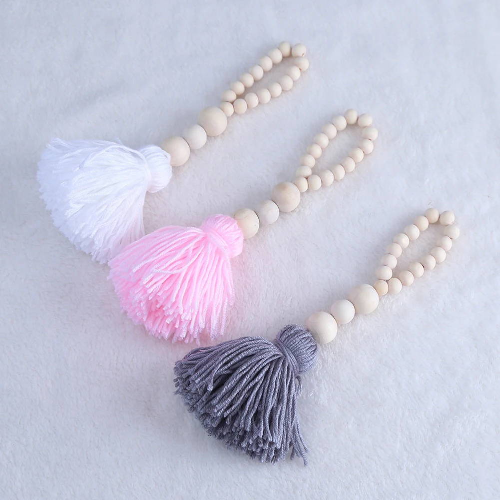 Скандинавские деревянные бусины с кисточками дизайн детской комнаты фото