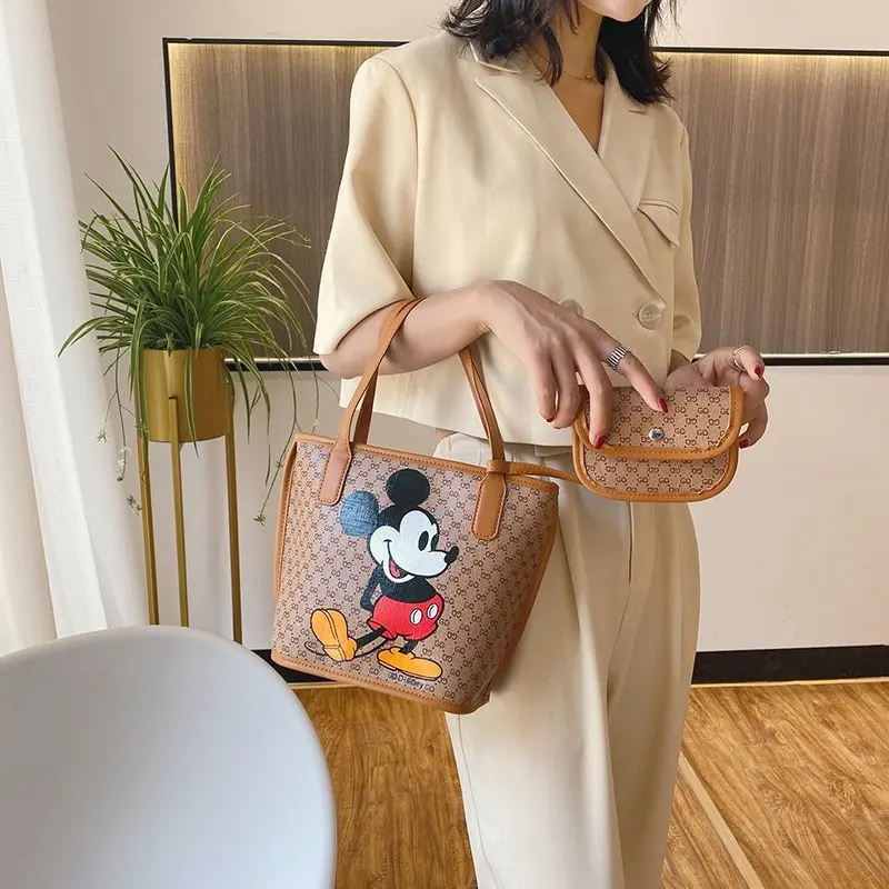 

2021 Disney Mickey Mouse Fashion Trend handbags Woman Casual Shopping bag mickey Minnie Portable Cartoon Pu Bag Ladies Chain Bag