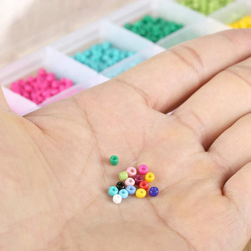 

9000 Pcs Glass Seed Beads 15 Multicolor Assortment Craft Seed Beads & 1900 Pcs 7-Color Round Alphabet Beaded