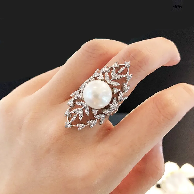 

Luxury Female White Leaf Plant Pearl Ring Silver Color Bridal Engagement Big Long Ring Vintage Party Rings For Women Zk40