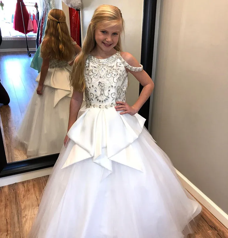 

legant Pure White Beaded Crystals Girls Pageant Dresses 2021 Jewel Neck Straps with Peplum Kids Formal Gown Party Birthday Dress