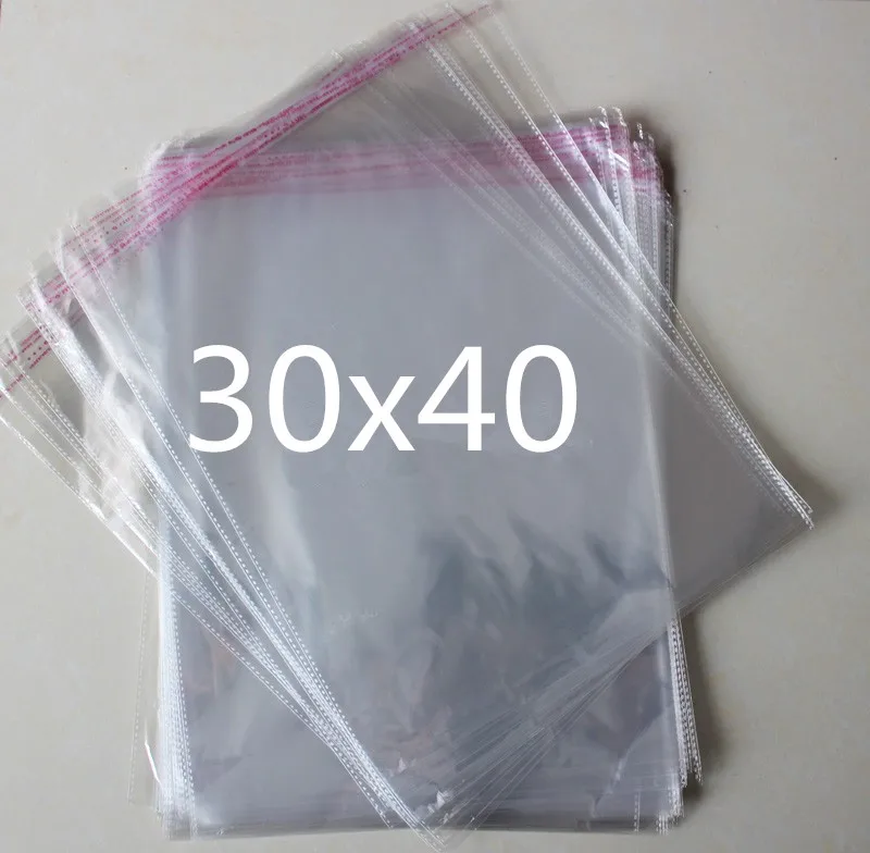 

30x40cm size transparent resealable cellophane/BOPP/plastic bag transparent Opp for self-adhesive sealing of plastic storage bag