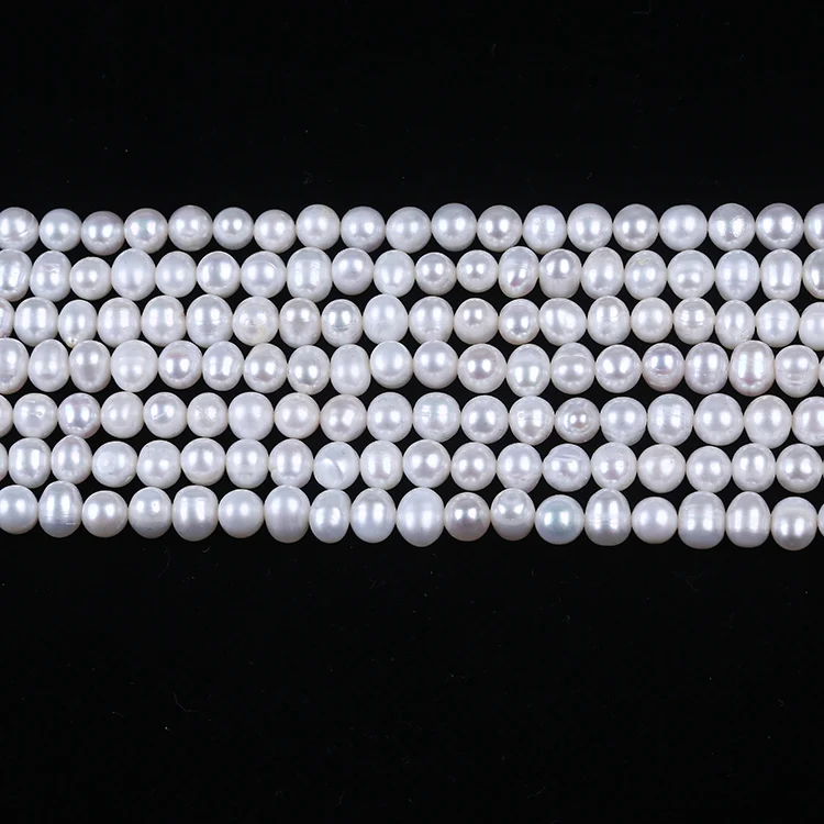 

long strand of 6mm white potato pearl strand