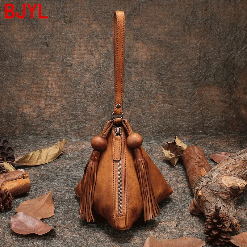 Новый литературный ретро портативный треугольный мешок для женщин Воловья кожа