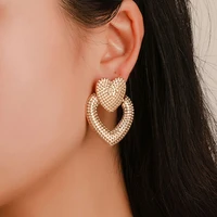 s1413 fashion jewelry heart earrings hollowed metal double peach heart stud earrings