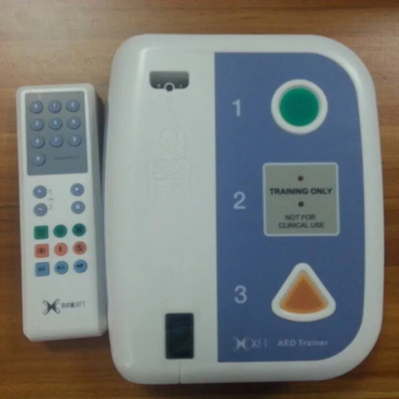 Шиньон первой помощи AED дефибриллятор симуляция Учебная модель медицинская