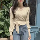 Женский вязаный свитер с глубоким V-образным вырезом